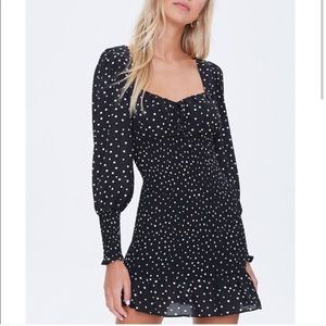 Polka dot smocked mini dress